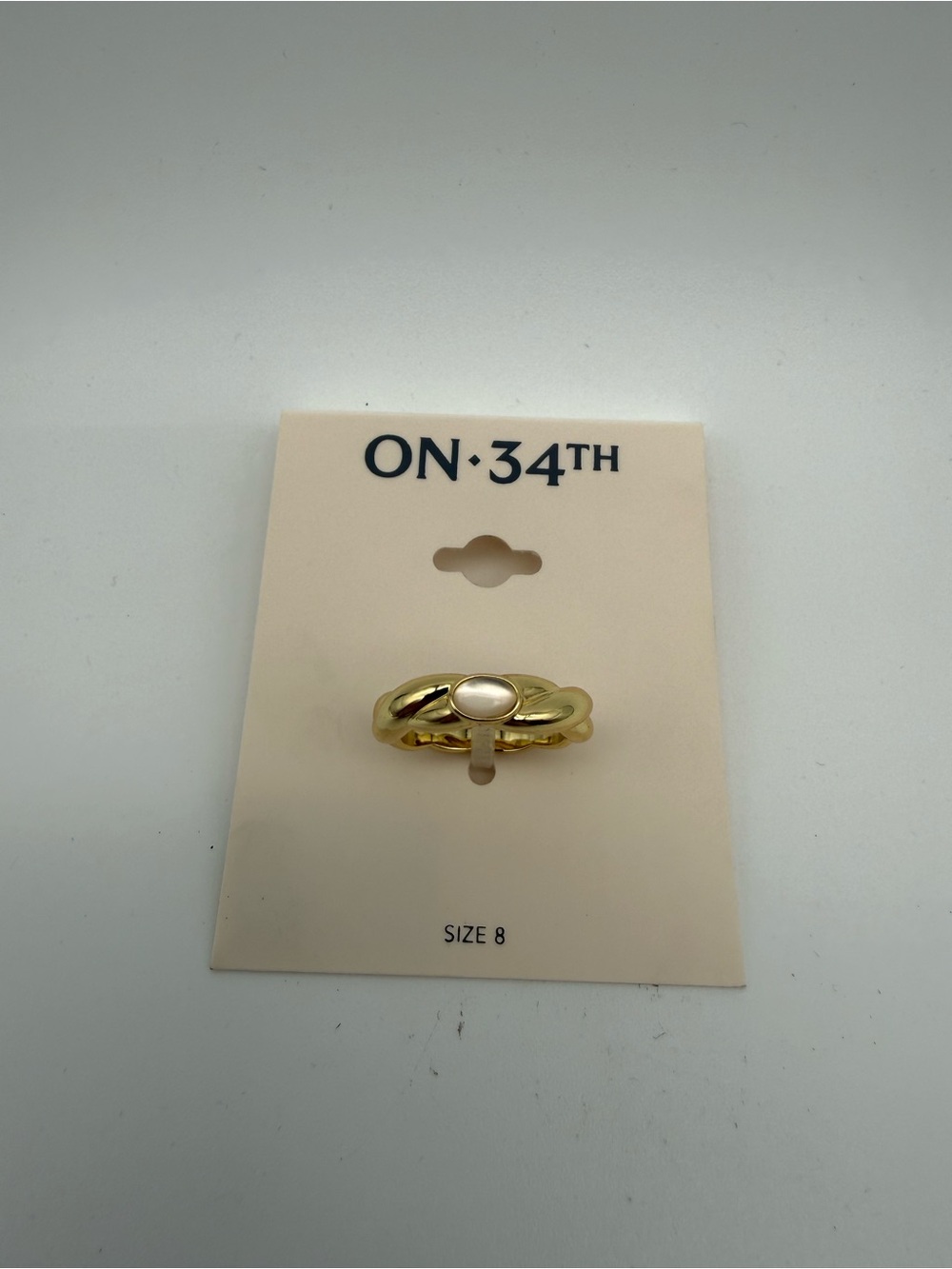 ON·34TH Gold Ring with Cream Oval Accent